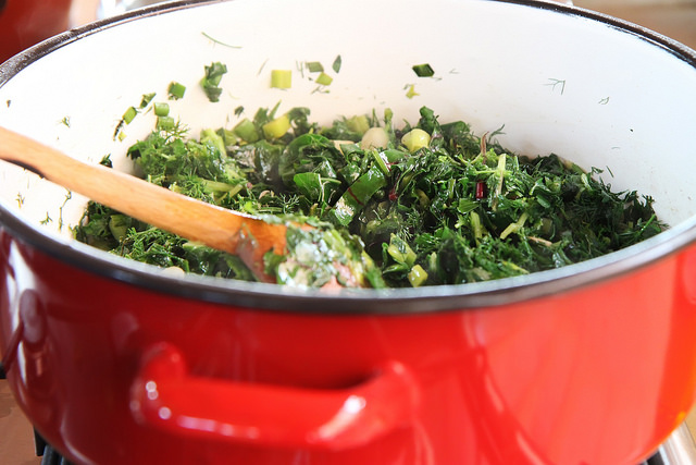 Greens in Red Enamel Pot by Olga Irez of Delicious Istanbul